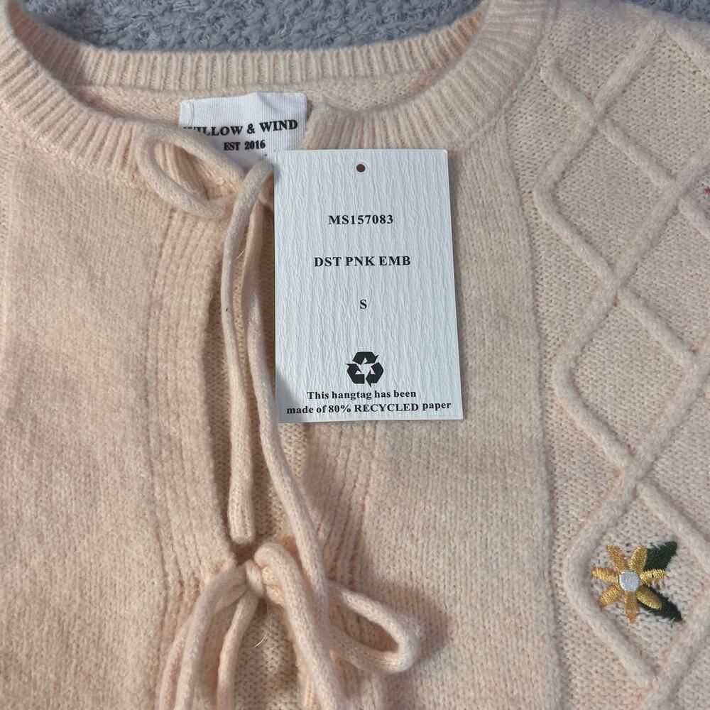 Wind and Willow NWT size small. Cable knit design with delicate tie front.